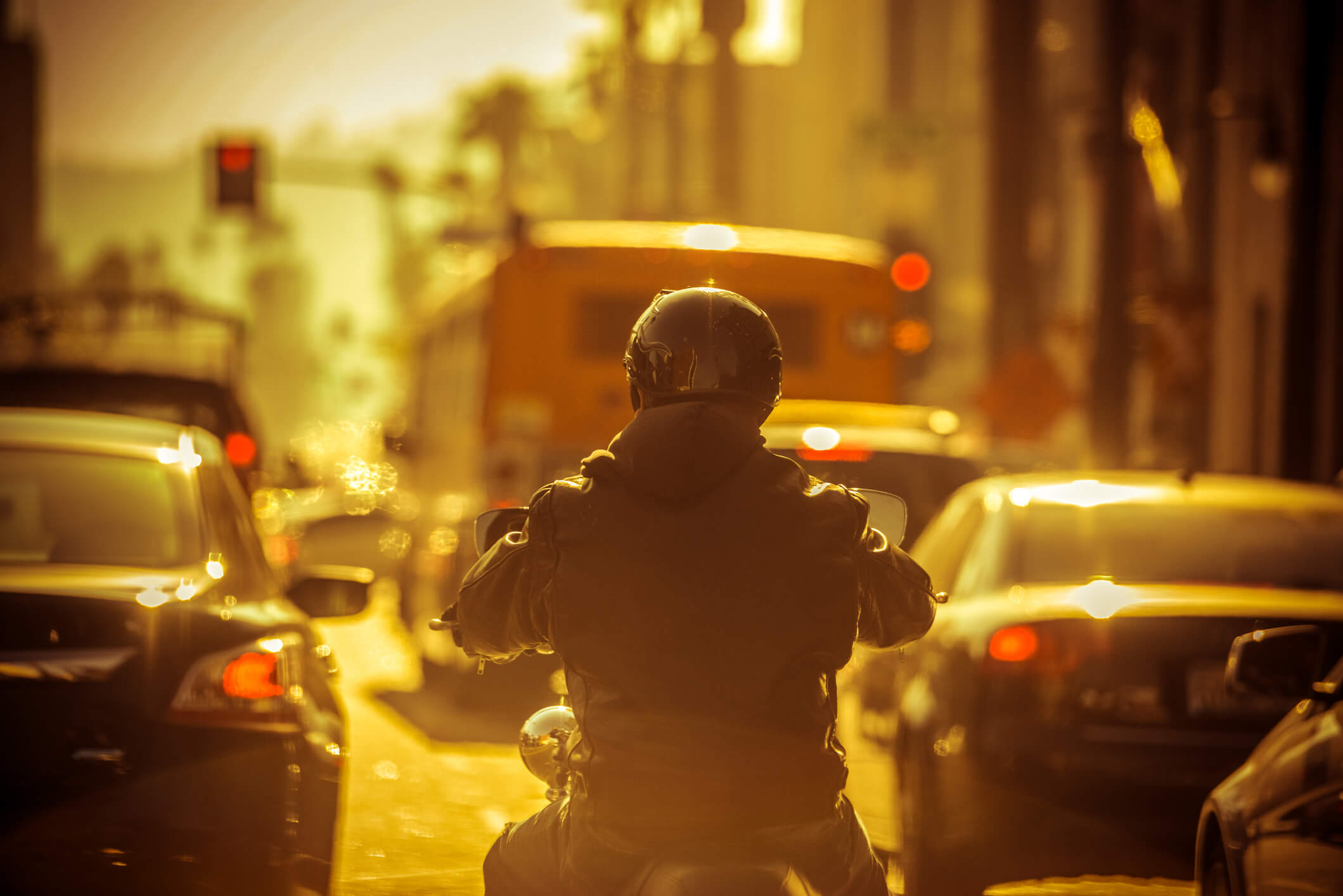 Motorcyclist at an intersection.