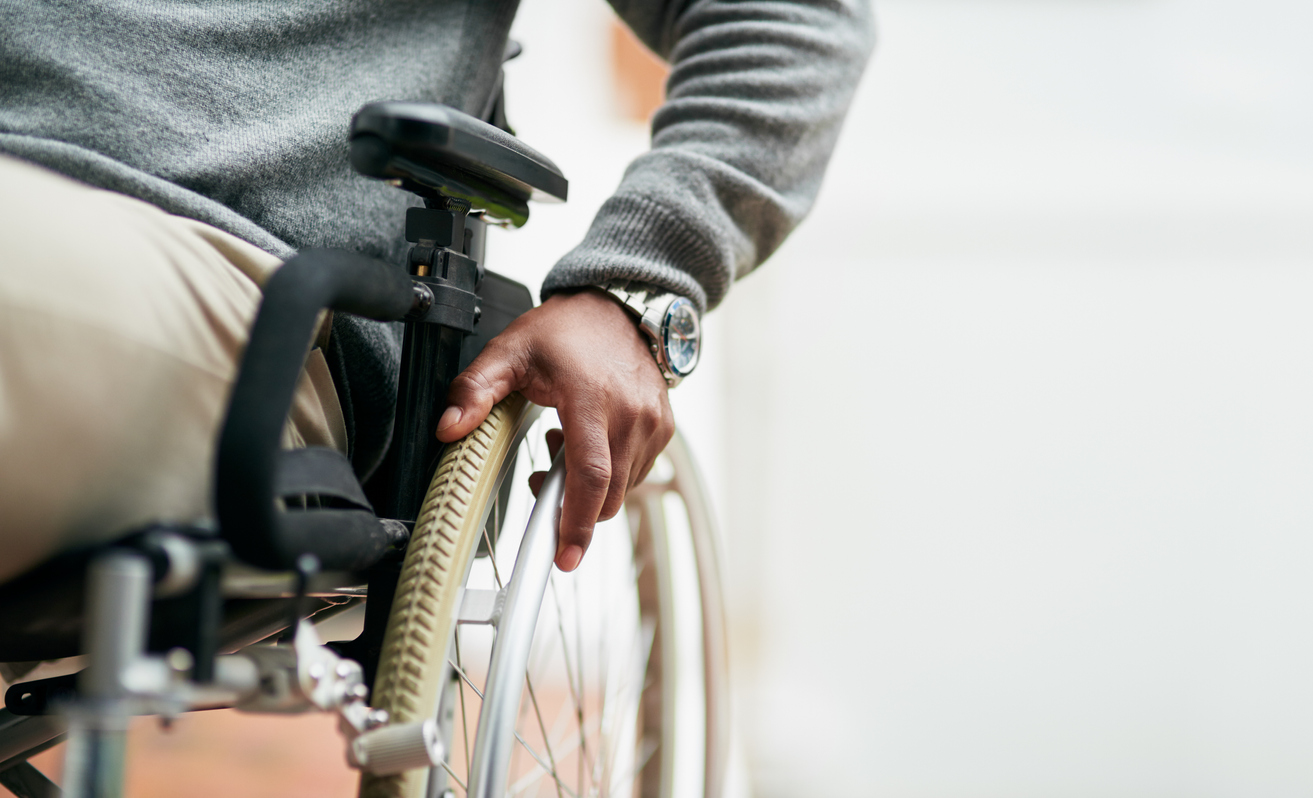 Man with quadriplegia in a wheelchair.