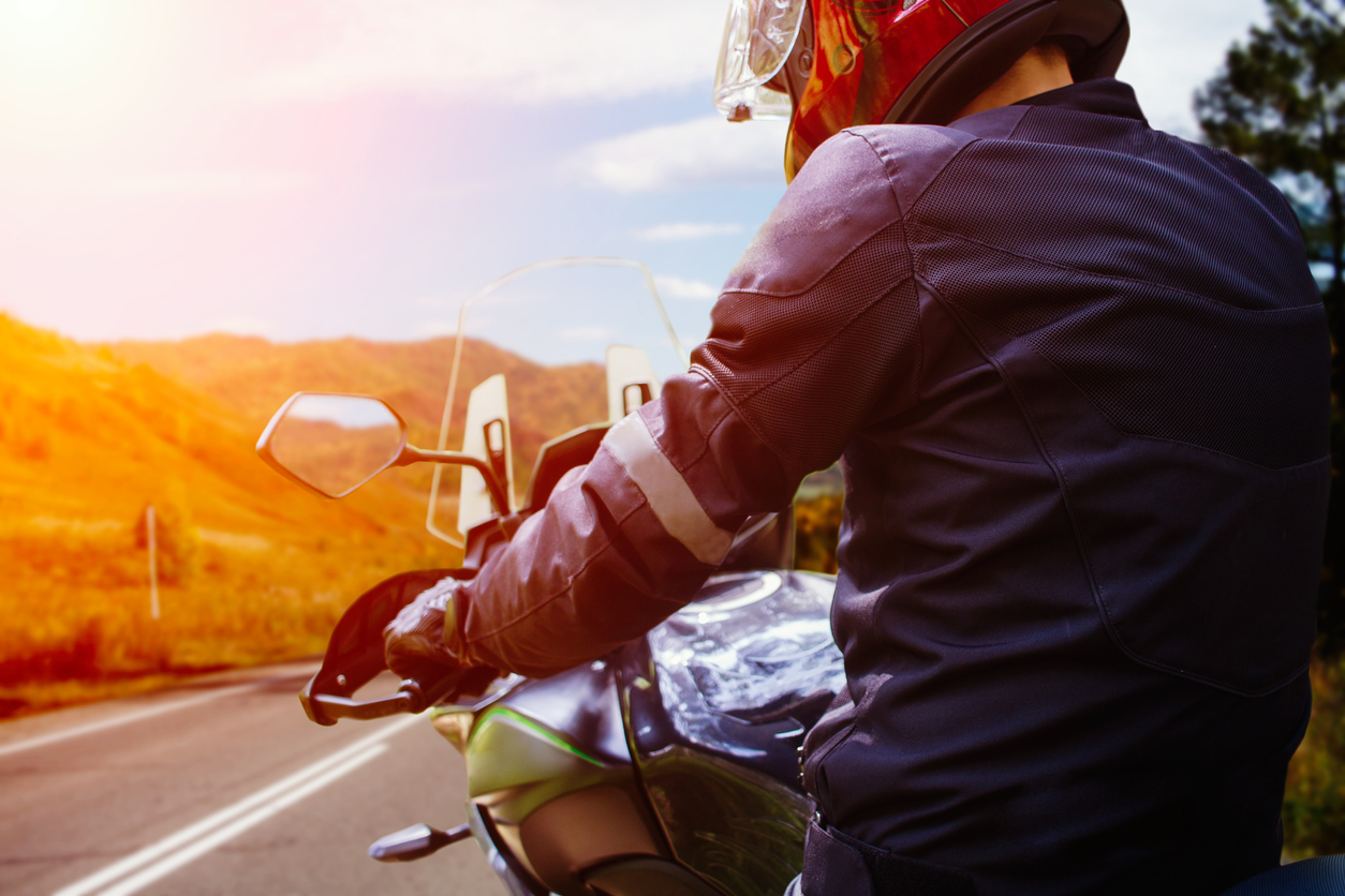 Man on a motorcycle.