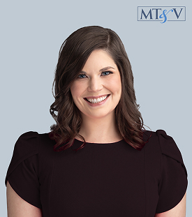 Smiling professional headshot of a woman with shoulder-length dark hair in a burgundy blouse against a light blue background; MT SV logo in the top-right corner.” leah  Miller, Tischler & Vislosky, P.C. leah  Miller, Tischler & Vislosky, P.C.