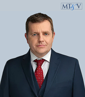 Professional headshot: man in a navy suit, white shirt, red tie, against a light blue background with the MTGSV logo in the top-right corner. martin  Miller, Tischler & Vislosky, P.C. martin  Miller, Tischler & Vislosky, P.C.